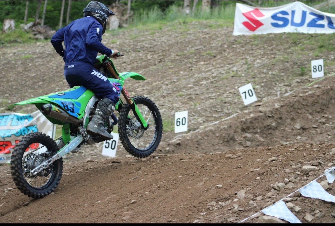 Dirt bike racer climbing Moonshine