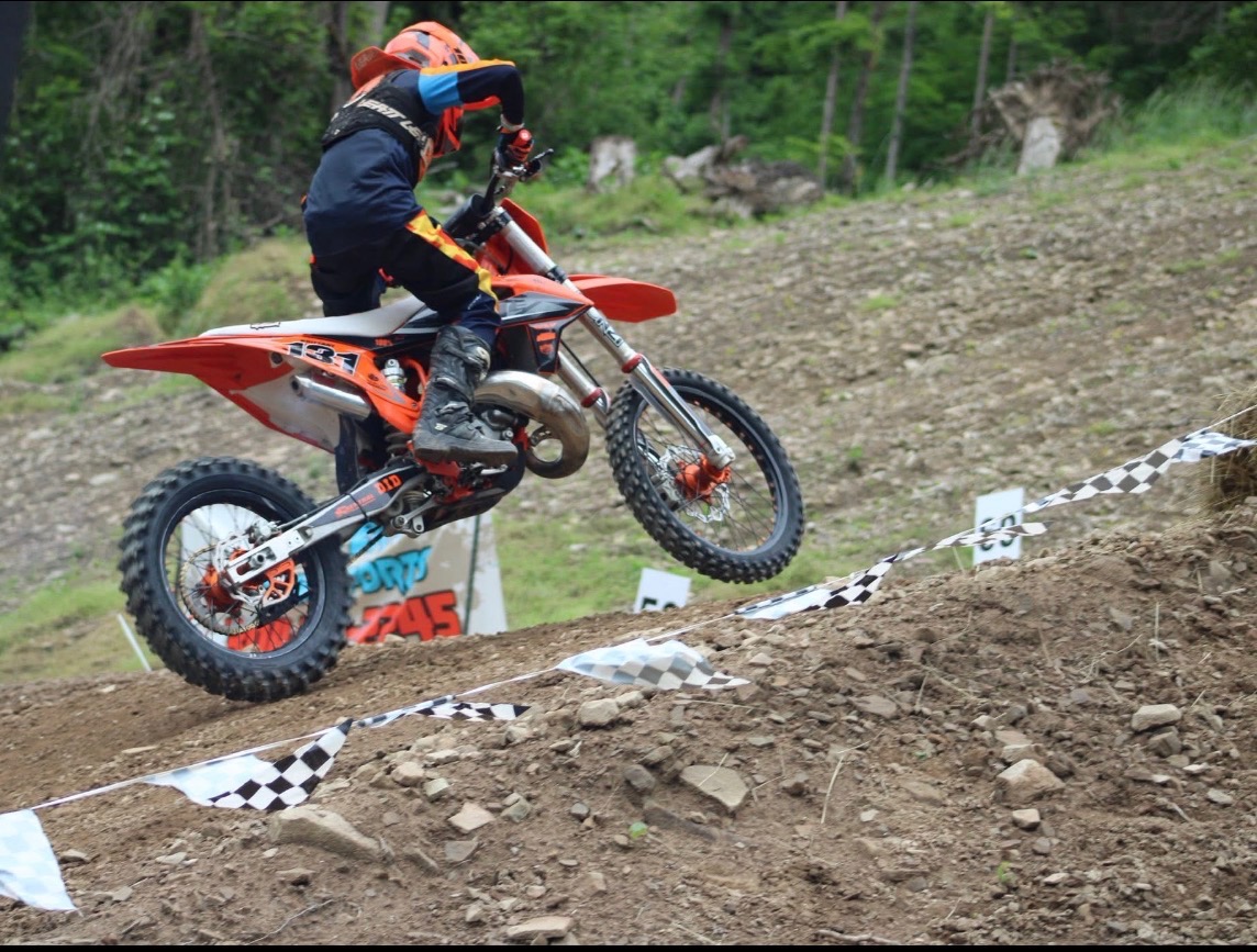 Rider climbing the marked hill course